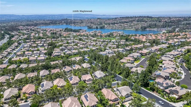 a view of a city with mountains in the background