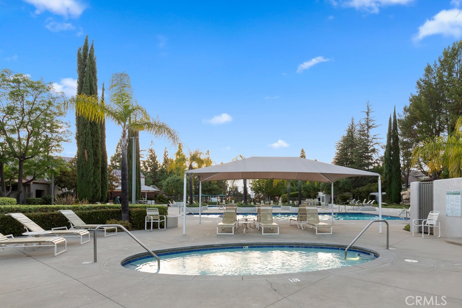 22681 Maplewood Mission Viejo, CA 92692 - Photo 59 of 71 a view of a swimming pool with outdoor seating and a potted plants
