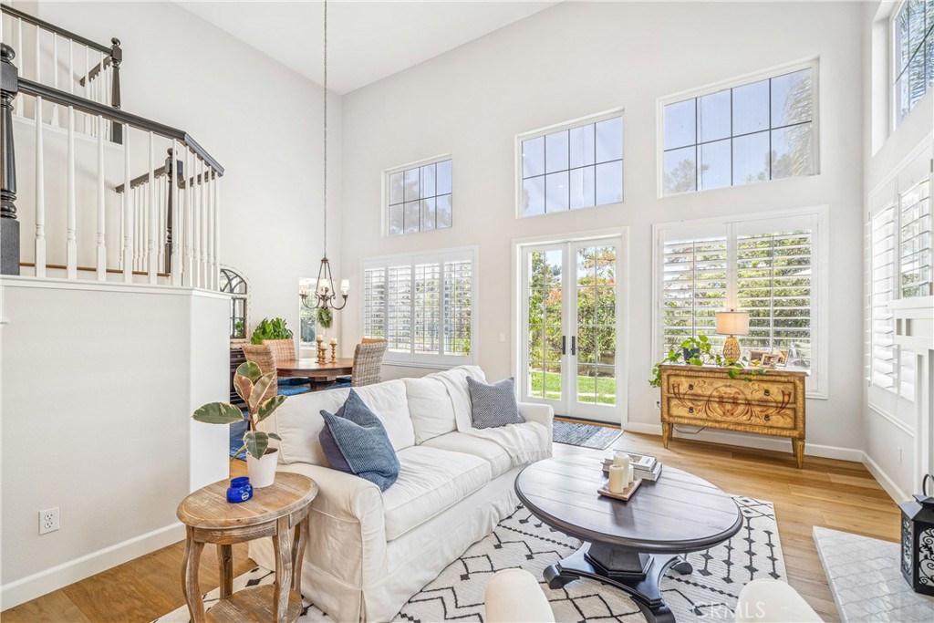 22681 Maplewood Mission Viejo, CA 92692 - Photo 6 of 71 a living room with furniture and a floor to ceiling window