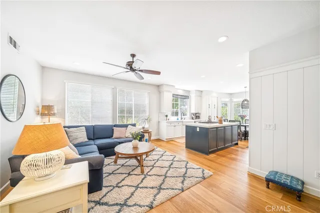 a kitchen with stainless steel appliances granite countertop a stove and a refrigerator