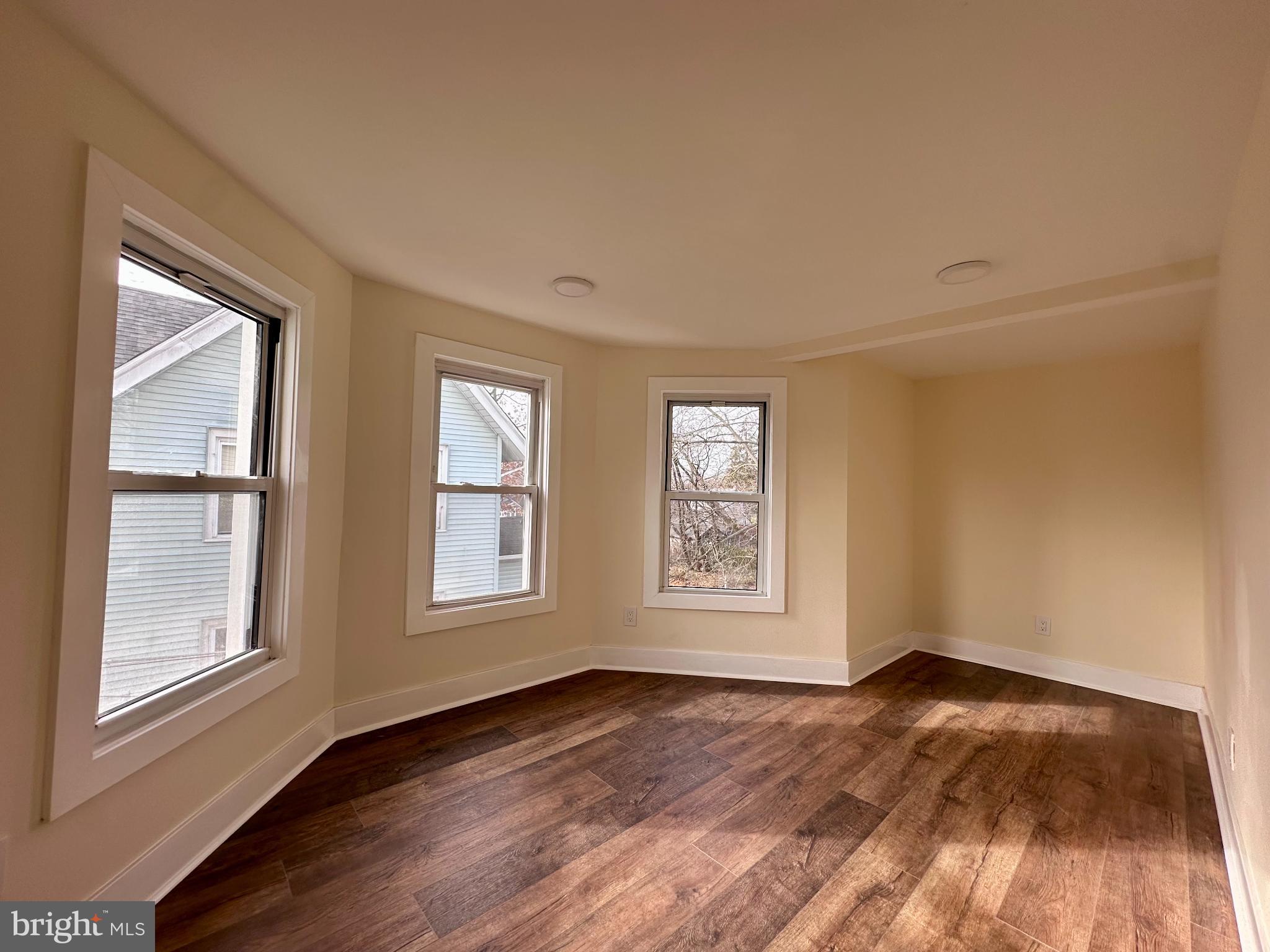 1019 North Broad Street Woodbury, NJ 08096 - Photo 19 of 37 Bright, airy room with charming windows.