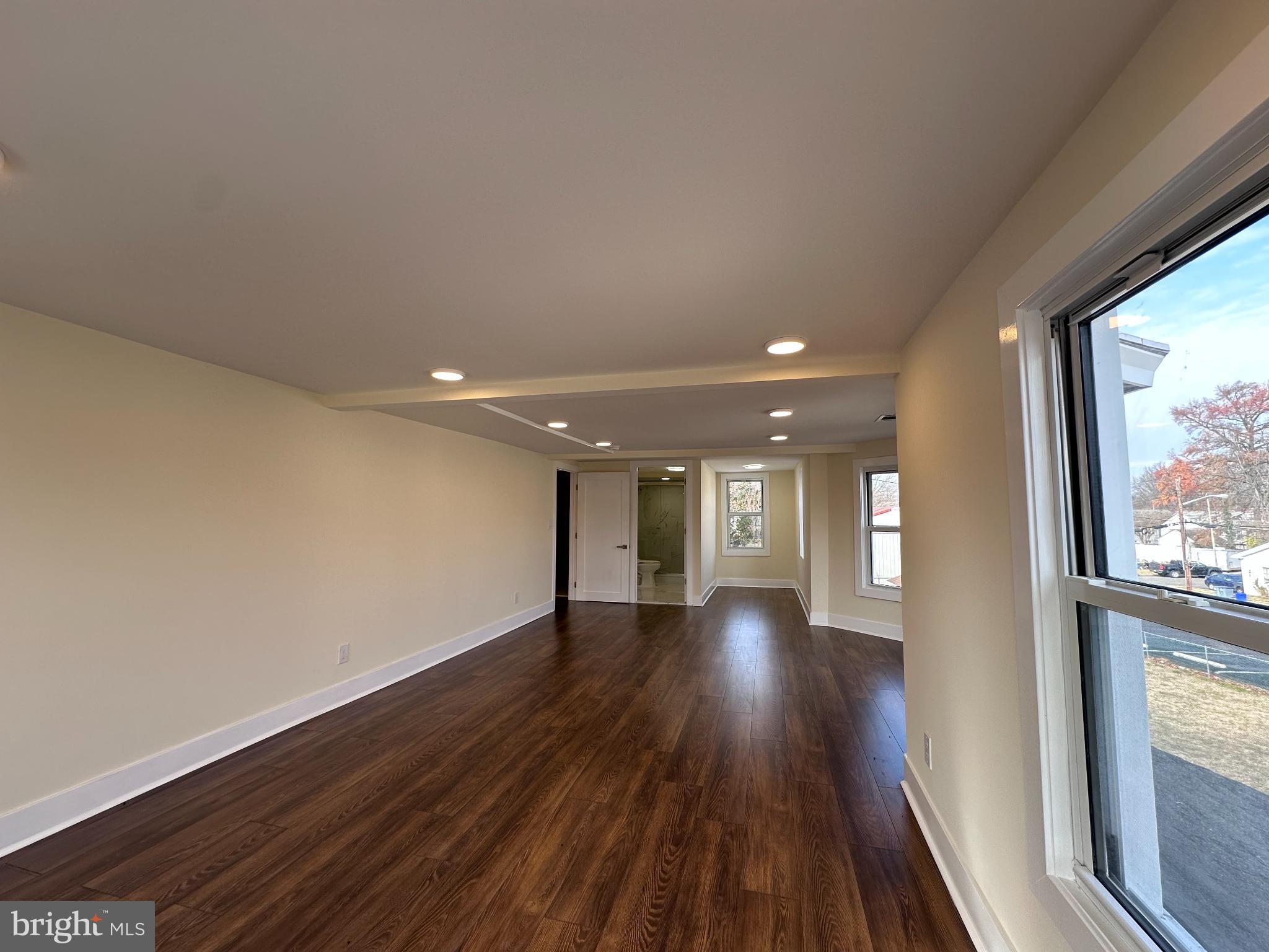 1019 North Broad Street Woodbury, NJ 08096 - Photo 23 of 37 Spacious, sunlit room with modern appeal.