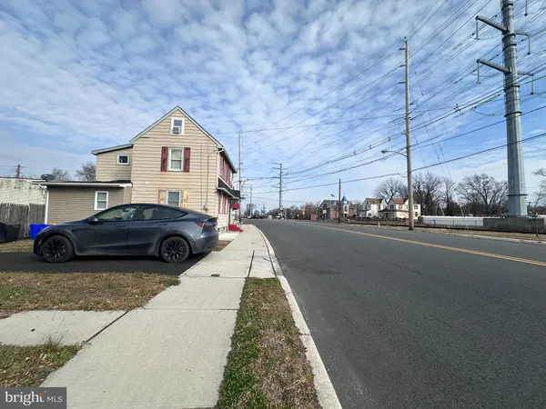a view of a street with houses