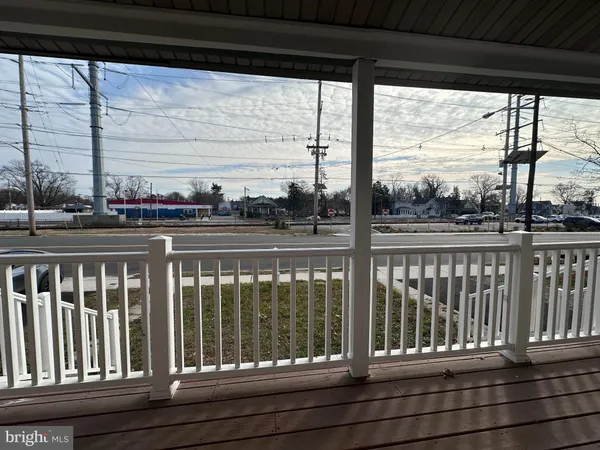 a view of a terrace with sitting area