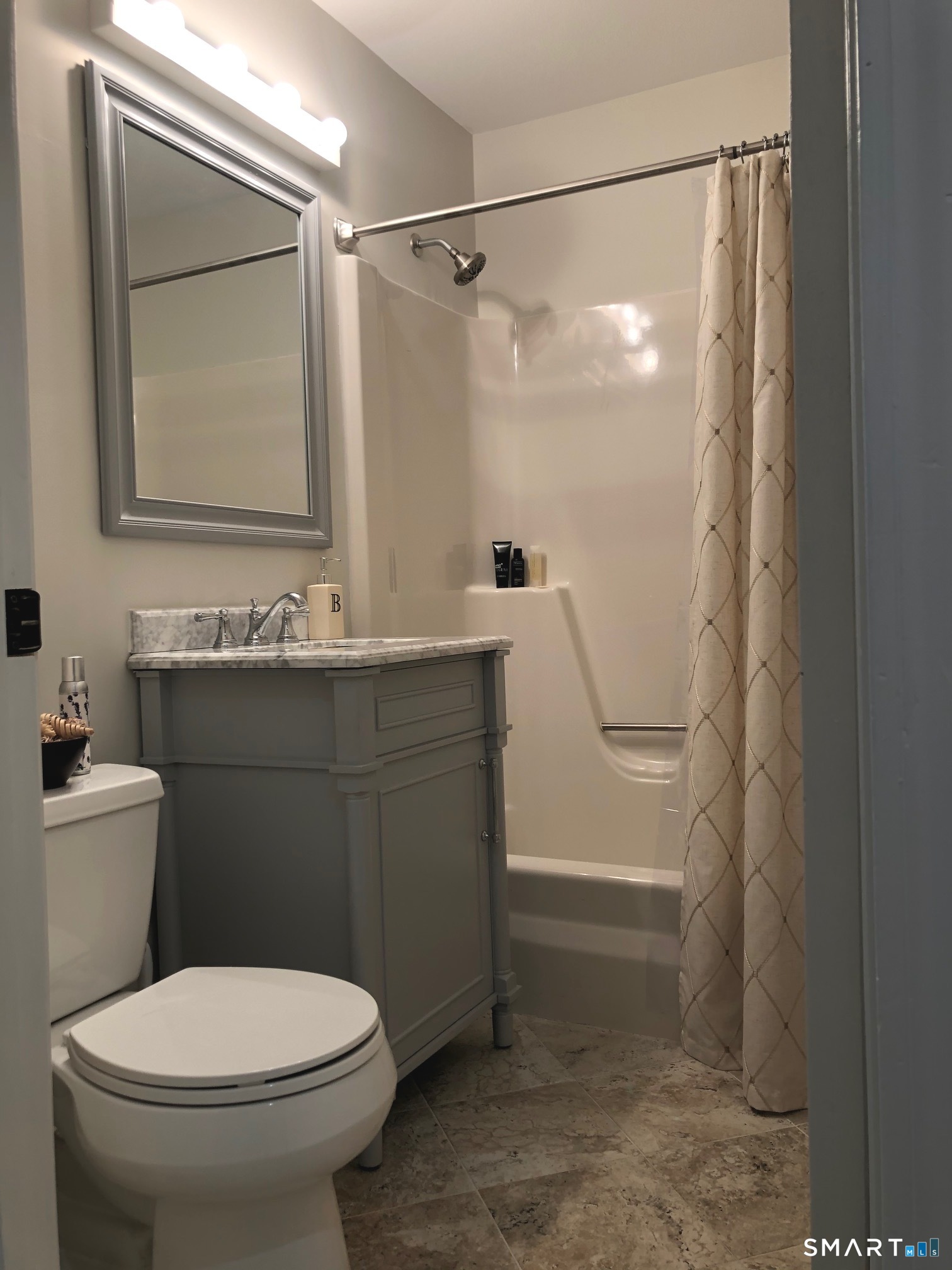 355 Ledge Drive, Unit 355 Torrington, CT 06790 - Photo 14 of 58 a bathroom with a sink a toilet and shower