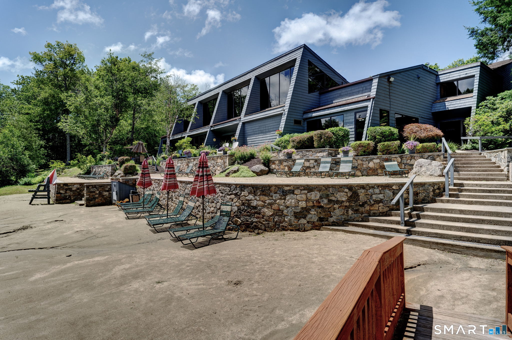 355 Ledge Drive, Unit 355 Torrington, CT 06790 - Photo 21 of 34 a front view of house with yard outdoor seating and barbeque oven