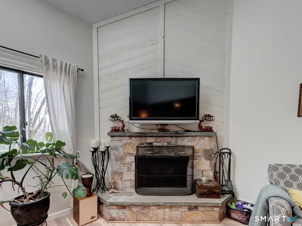 a view of a lake with a house in the background
