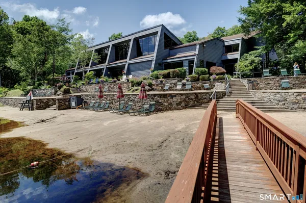 a view of swimming pool with seating space