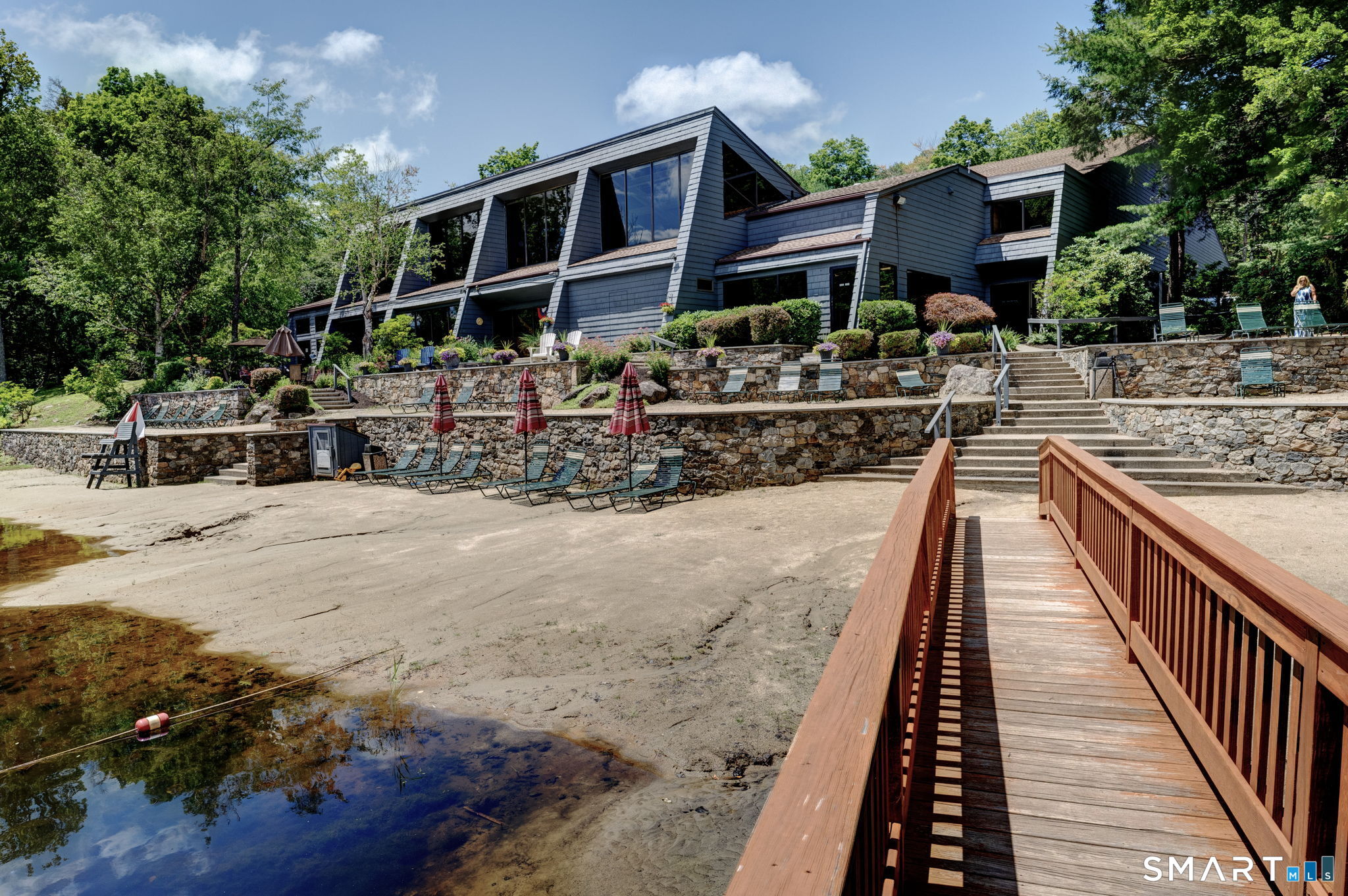 355 Ledge Drive, Unit 355 Torrington, CT 06790 - Photo 25 of 34 a view of house with wooden deck and outdoor space