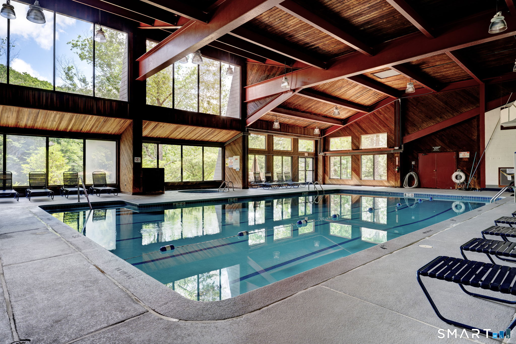 355 Ledge Drive, Unit 355 Torrington, CT 06790 - Photo 28 of 34 an outdoor view of a porch with seating space