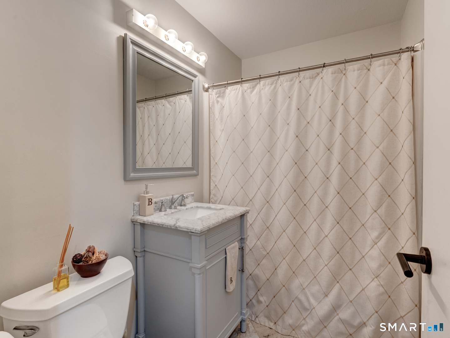 355 Ledge Drive, Unit 355 Torrington, CT 06790 - Photo 29 of 58 a bathroom with a sink and a toilet