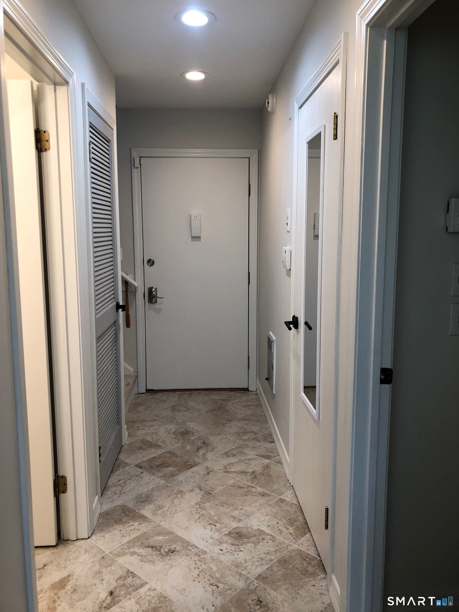 355 Ledge Drive, Unit 355 Torrington, CT 06790 - Photo 32 of 58 en view of a hallway with a door