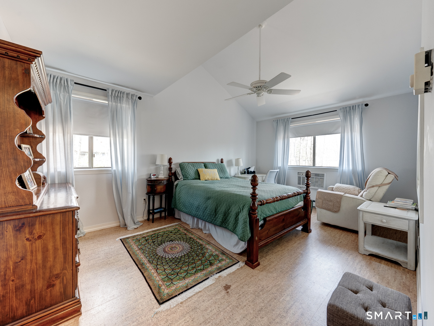 355 Ledge Drive, Unit 355 Torrington, CT 06790 - Photo 37 of 58 a bedroom with a bed and wooden floor