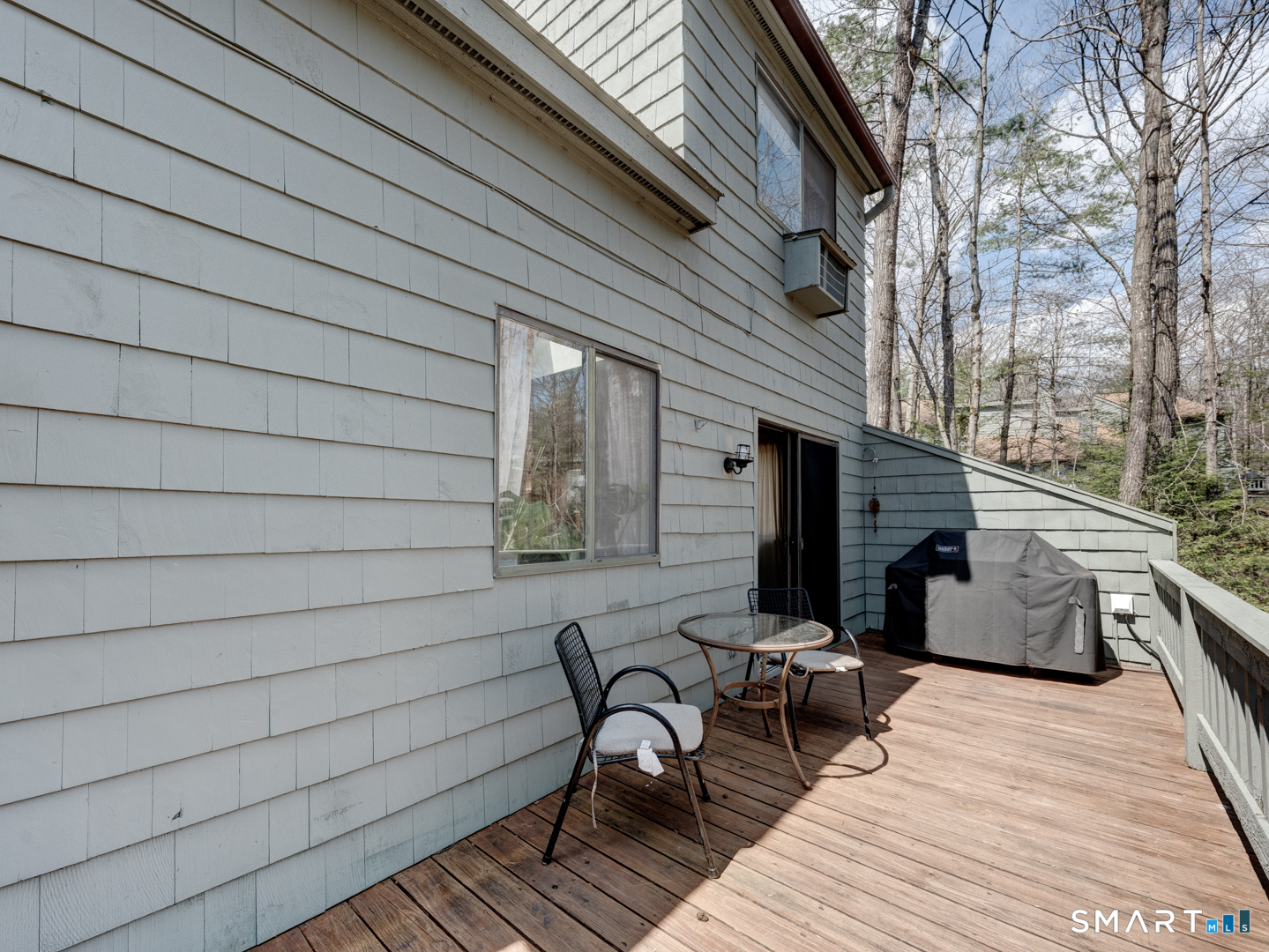 355 Ledge Drive, Unit 355 Torrington, CT 06790 - Photo 44 of 58 a view of balcony with wooden floor and outdoor seating