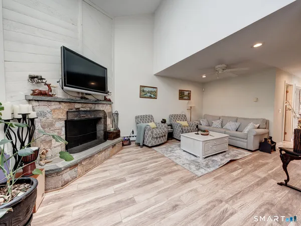 a kitchen with stainless steel appliances granite countertop a stove and a refrigerator