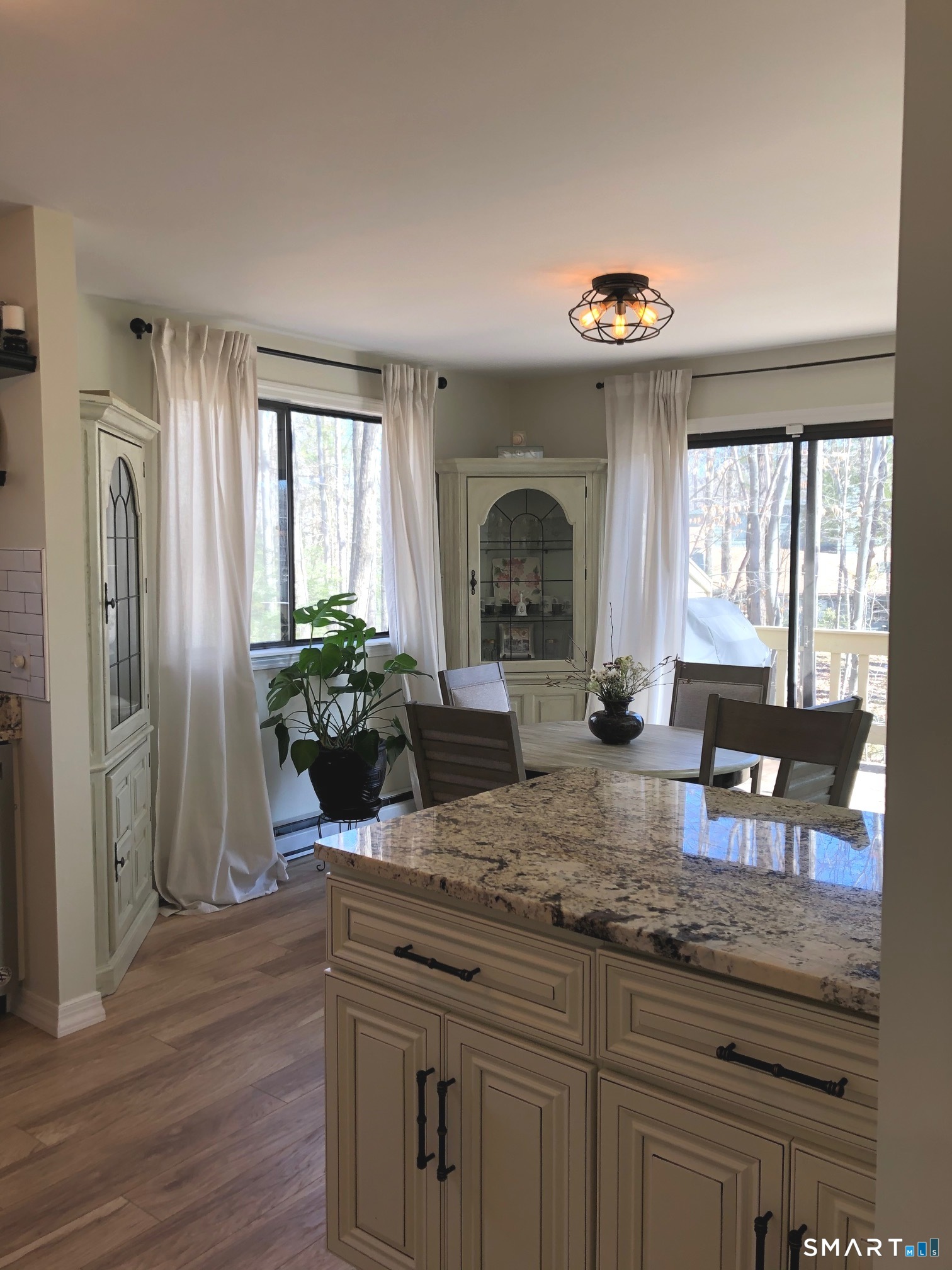 355 Ledge Drive, Unit 355 Torrington, CT 06790 - Photo 10 of 58 a kitchen with sink refrigerator and window
