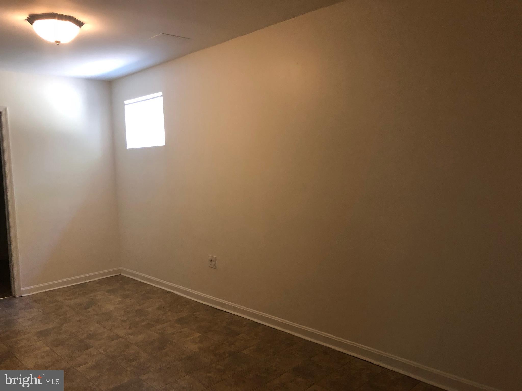 11234 Commanche Road Lusby, MD 20657 - Photo 13 of 21 an empty room with a window