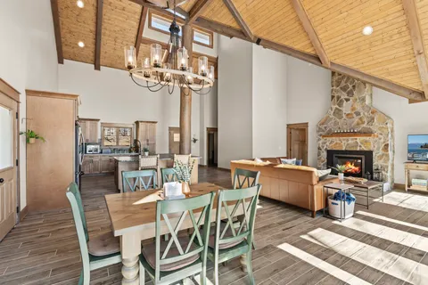 a view of a livingroom with furniture and a fireplace