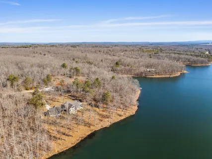 an aerial view of beach and city space