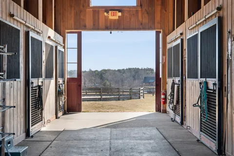 a view of a bathroom with a shower and a tub