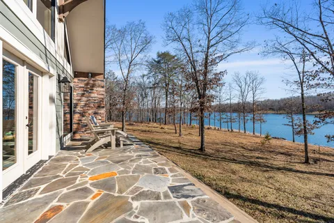 a view of a backyard of the house