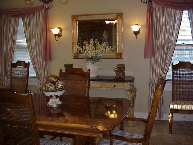 3605 South Hayden Street Amarillo, TX 79110 - Photo 3 of 4 a living room with furniture and a fireplace