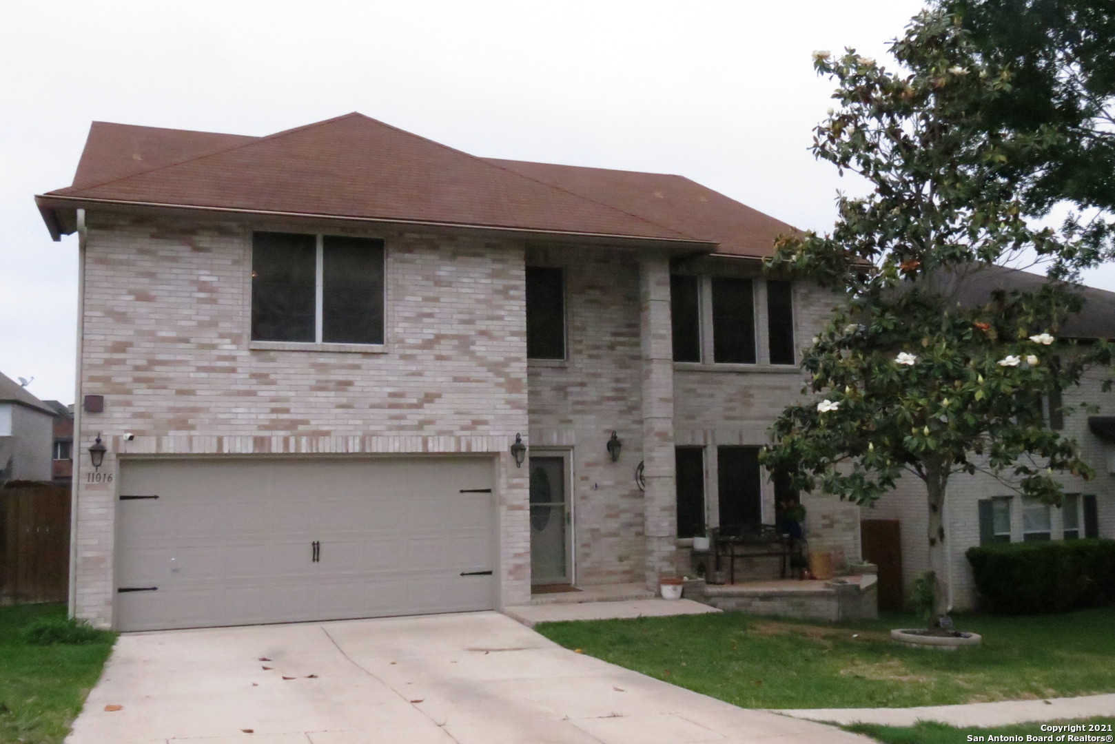 a front view of house with yard
