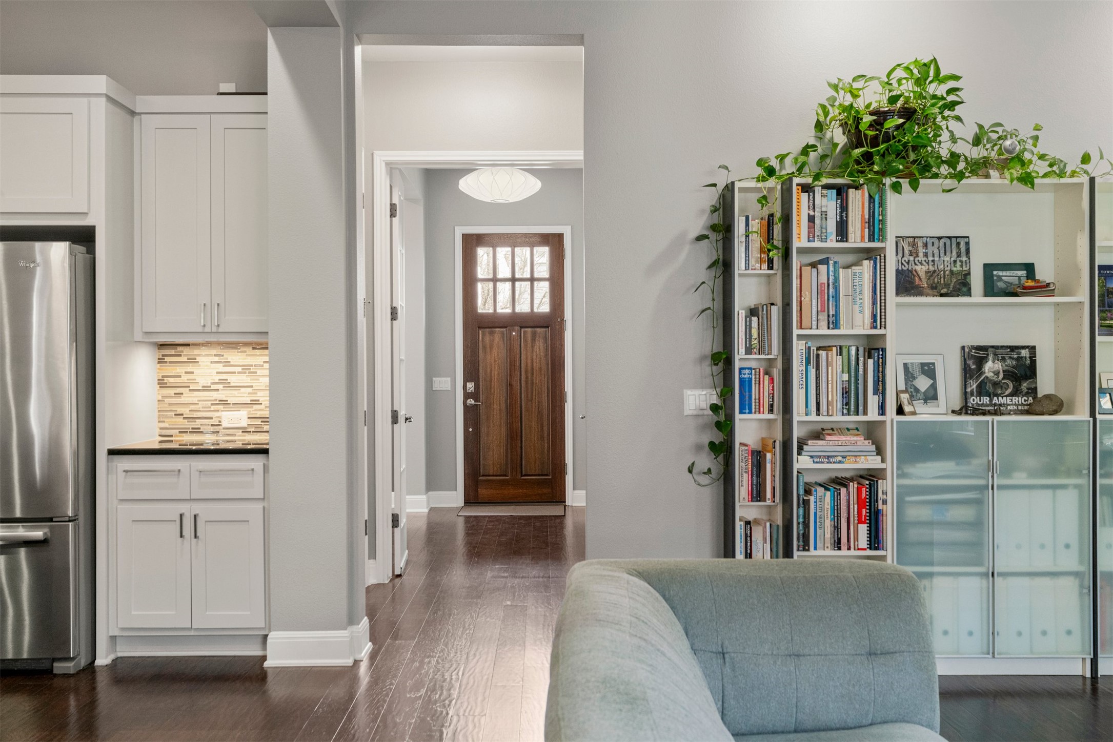 4512 Ruiz Street Austin, TX 78723 - Photo 13 of 38 a living room with furniture and a book shelf