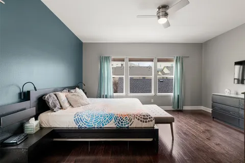 a bedroom with a bed and a walk in closet