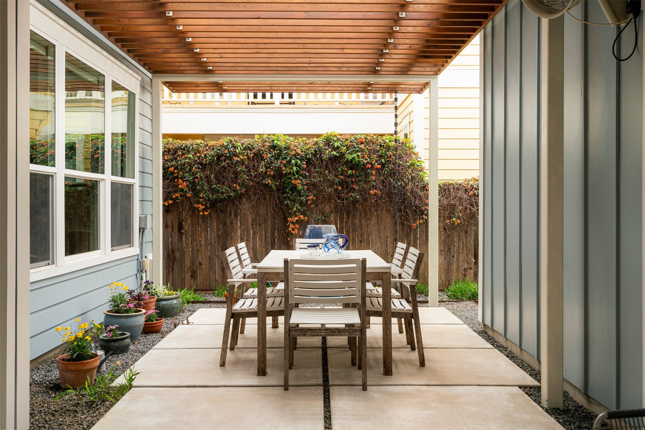 4512 Ruiz Street Austin, TX 78723 - Photo 35 of 40 The patio and grilling area work together as an extension of the home’s living space, offering room for outdoor dining, weekend cookouts, or relaxed evenings under the pergola