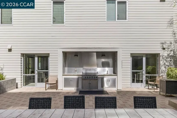 a view of building with outdoor space and swimming pool