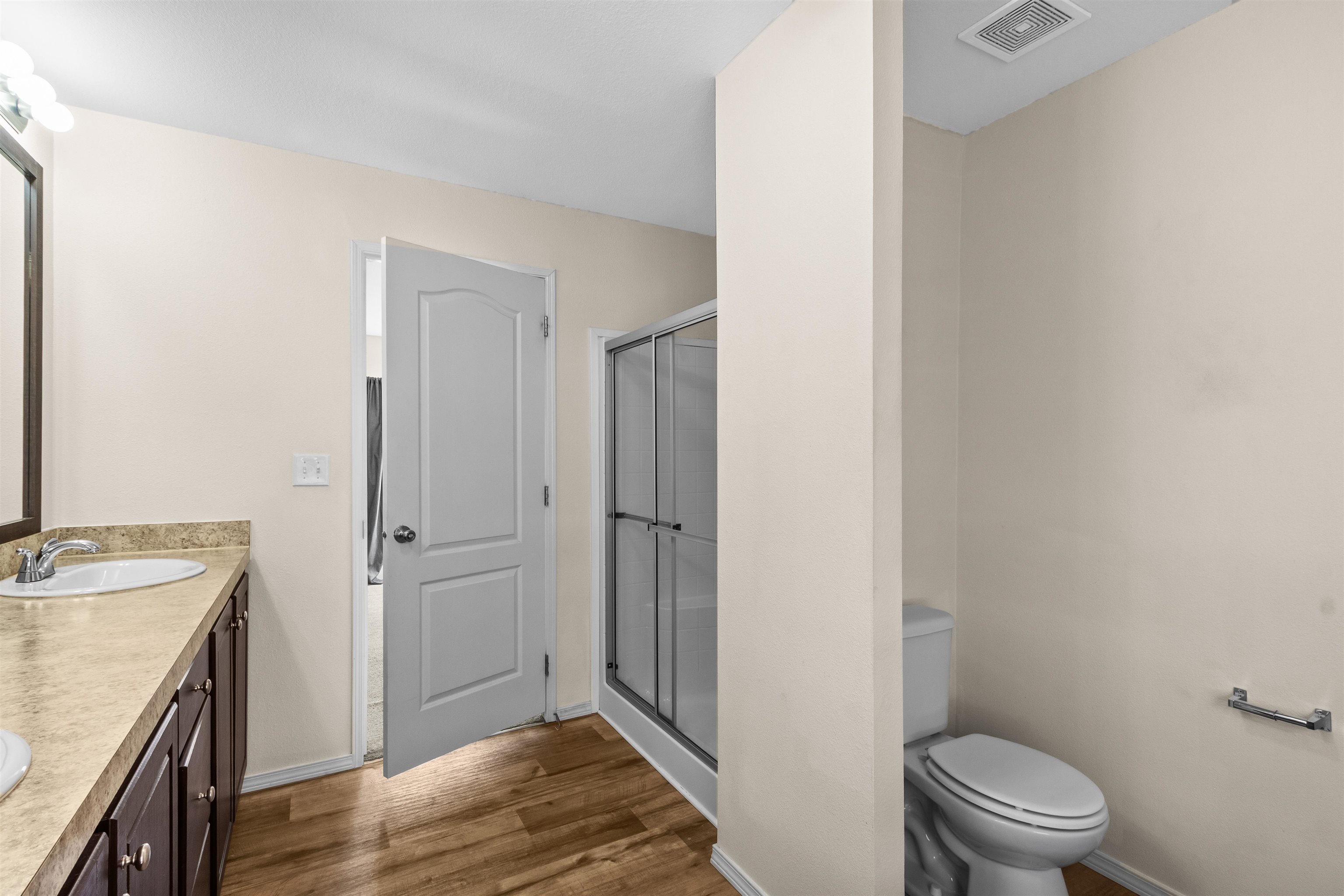 759 33 Road Clifton, CO 81520 - Photo 14 of 35 a bathroom with a granite countertop sink toilet and a mirror