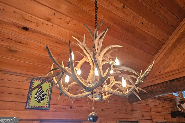 a bathroom with a granite countertop sink mirror vanity and toilet