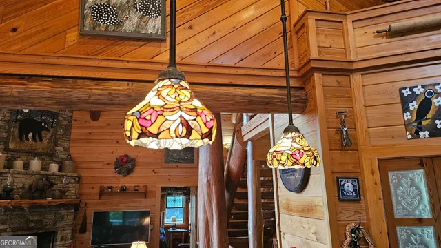 a bed room with a bed and a chandelier