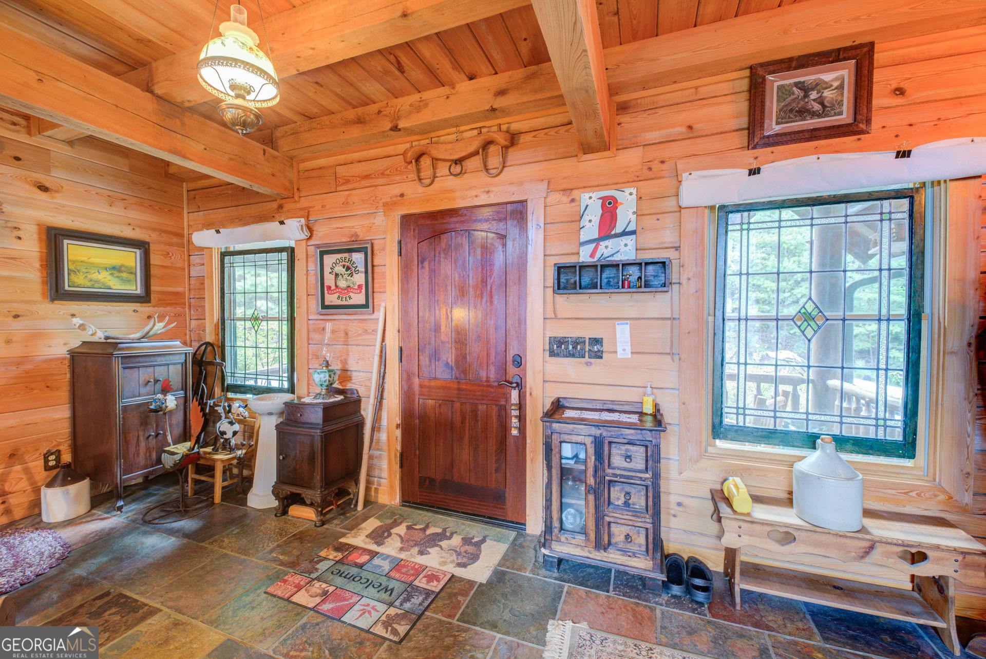 38 Old Blue Trail Tiger, GA 30576 - Photo 53 of 72 a living room with furniture a fireplace and a flat screen tv