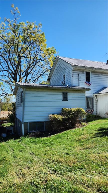 476 Hartwick Road Mercer, PA 16137 - Photo 5 of 22 a front view of a house with a garden
