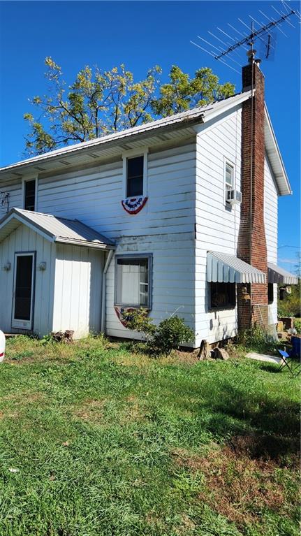 476 Hartwick Road Mercer, PA 16137 - Photo 6 of 22 a front view of a house with garden