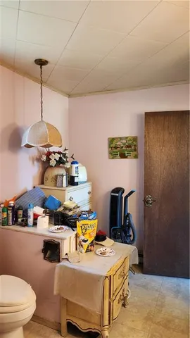 a dining room with a table and chairs