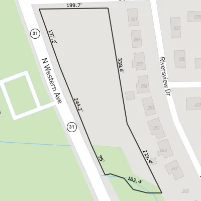 a view of a hallway with staircase