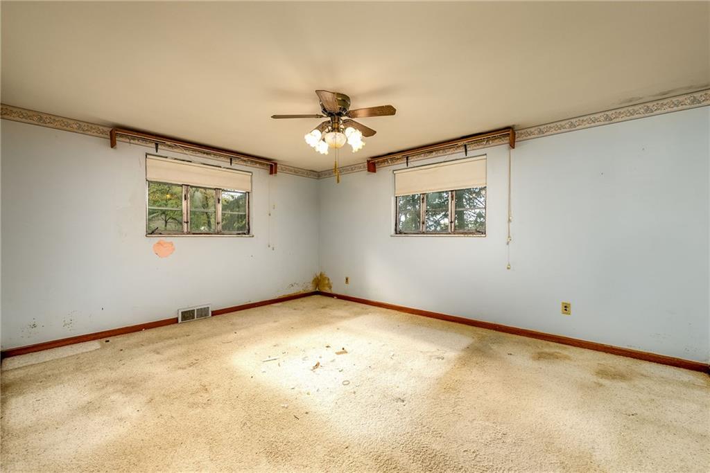 3166 Harts Run Road Glenshaw, PA 15116 - Photo 11 of 30 a view of an empty room with a window