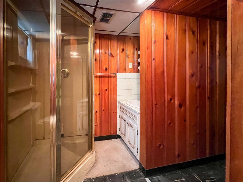 3166 Harts Run Road Glenshaw, PA 15116 - Photo 16 of 30 a view of a bathroom with a shower and a sink