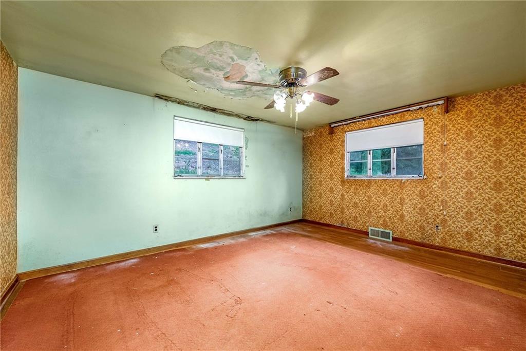 3166 Harts Run Road Glenshaw, PA 15116 - Photo 21 of 30 en empty room with windows