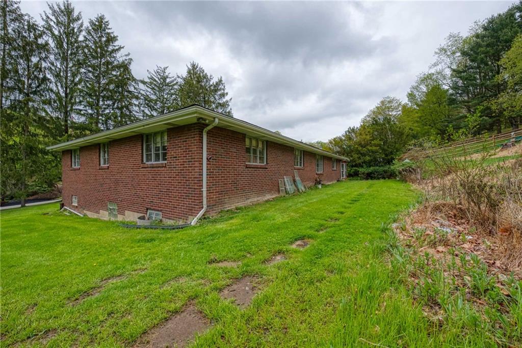 3166 Harts Run Road Glenshaw, PA 15116 - Photo 30 of 30 a view of a backyard with a garden
