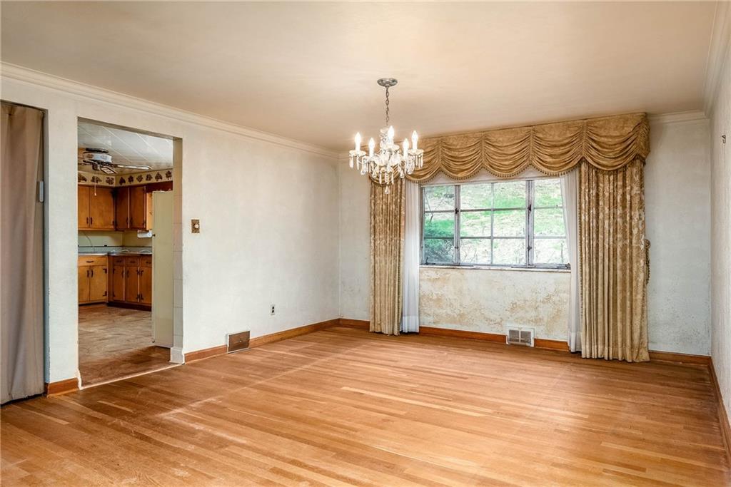 3166 Harts Run Road Glenshaw, PA 15116 - Photo 8 of 30 wooden floor in an empty room with a window