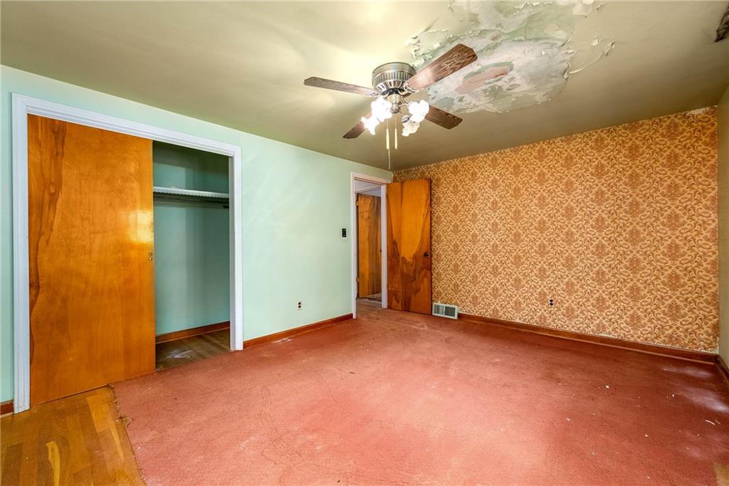 3166 Harts Run Road Glenshaw, PA 15116 - Photo 9 of 30 a view of an empty room with a chandelier fan