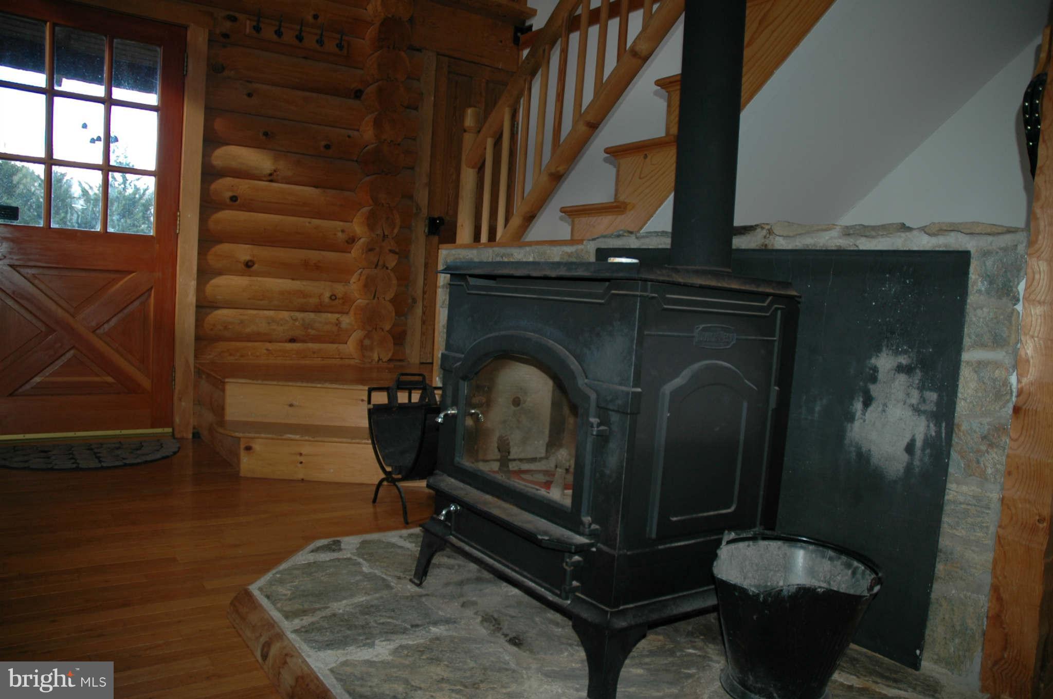 20111 Gunpowder Road Manchester, MD 21102 - Photo 15 of 30 a living room with furniture and a fireplace