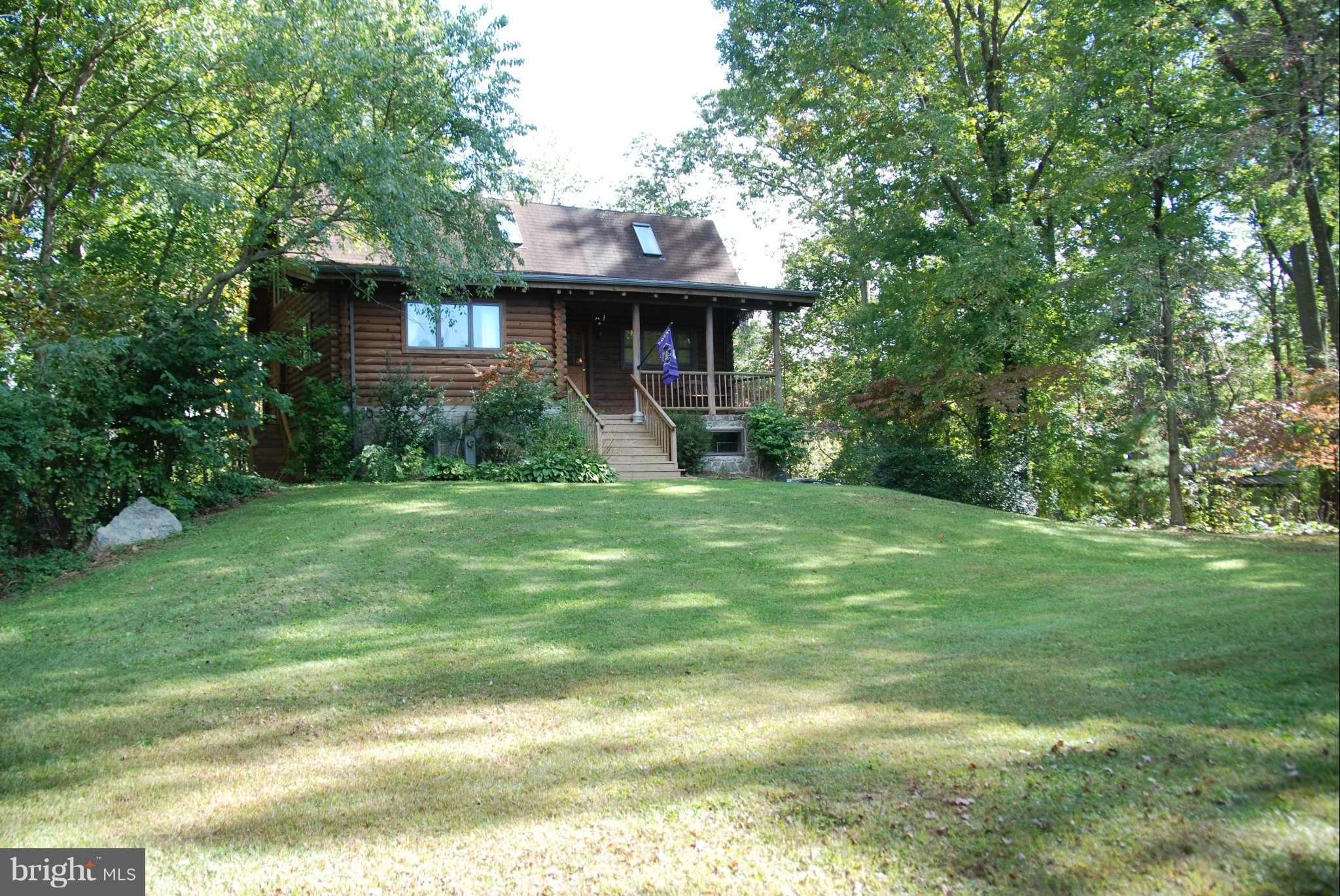 20111 Gunpowder Road Manchester, MD 21102 - Photo 3 of 30 a front view of a house with garden