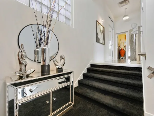 a view of entryway with wooden floor