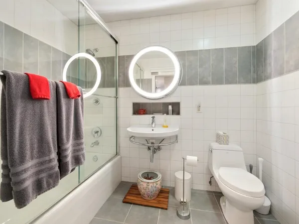 a bedroom with a bed and a couch