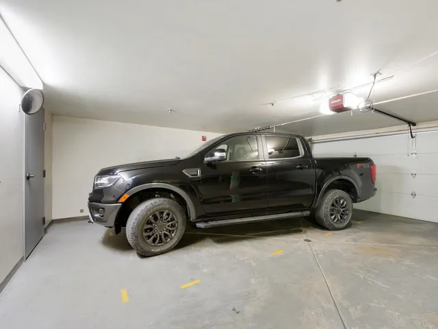 a view of a hallway with brick walls